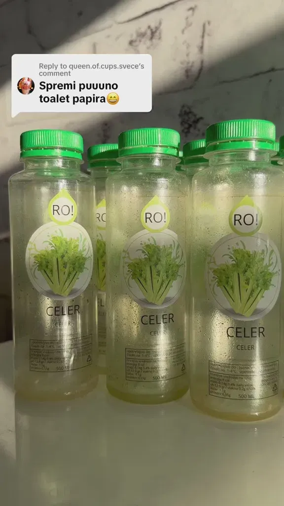 RO! bottles of cold-pressed celery juice with fresh green celery